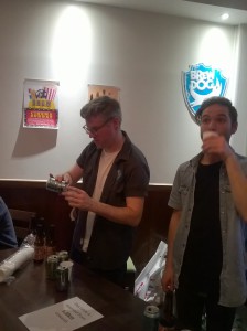 Two BrewDog employees getting ready for the free beer tasting session in The Gilchrist Postgraduate Club for Welcome Fortnight 2015.